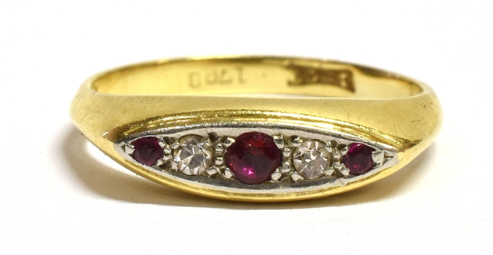 A MARKED 18CT RUBY AND DIAMOND BOAT RING The yellow gold shank with stamped 18ct mark, ring size