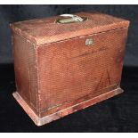 AN EDWARDIAN TRAVELLING STATIONERY BOX the hinged top inset with carrying handle, opening to well