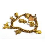 A 9CT GOLD CHARM BRACELET Together with a separate unattached 9ct gold Koala Bear charm, the