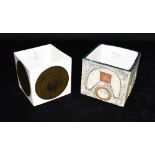 A TROIKA POTTERY CUBE VASE each side with textured and incised geometric decoration, 9cm cube,