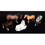 FOUR BESWICK HORSES the largest 14cm high, together with a Lomonosov horse Condition Report : all in