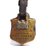 AN R.S.P.C.A. HORSE BRASS marked 'MERIT BADGE / R.S.P.C.A. / LONDON / CART HORSE / PARADE / 1933'.