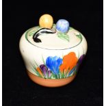 A CLARICE CLIFF BIZARRE 'CROCUS' PATTERN PRESERVE POT AND COVER 8cm high Condition Report : good