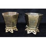 A PAIR OF CHINESE INCENSE BURNERS of tapering hexagonal form with ornate pierced bases, the side