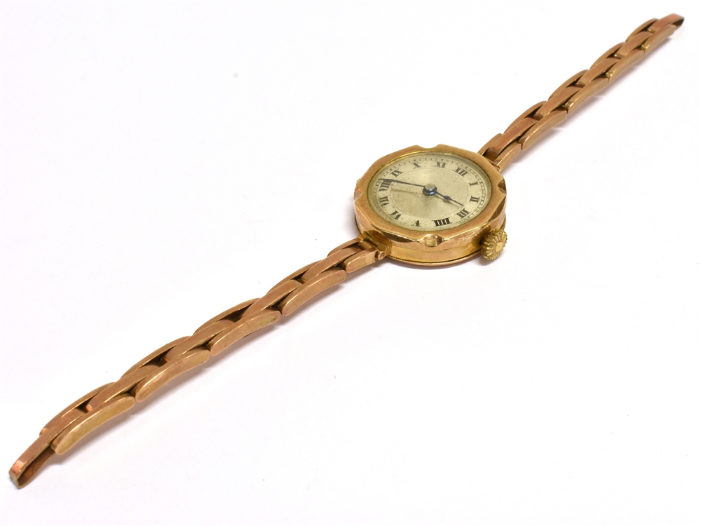 A 9CT GOLD ROSE GOLD VINTAGE WRISTWATCH The inside case marked LAGAROS Swiss made 15 jewels, strap