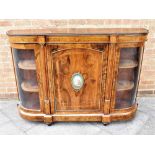 A VICTORIAN GILT METAL MOUNTED WALNUT CREDENZA with marquetry decoration, the central door centred