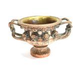 A VICTORIAN COPPER CACHE POT modelled after the Warwick vase, 18cm high 31cm wide across handles