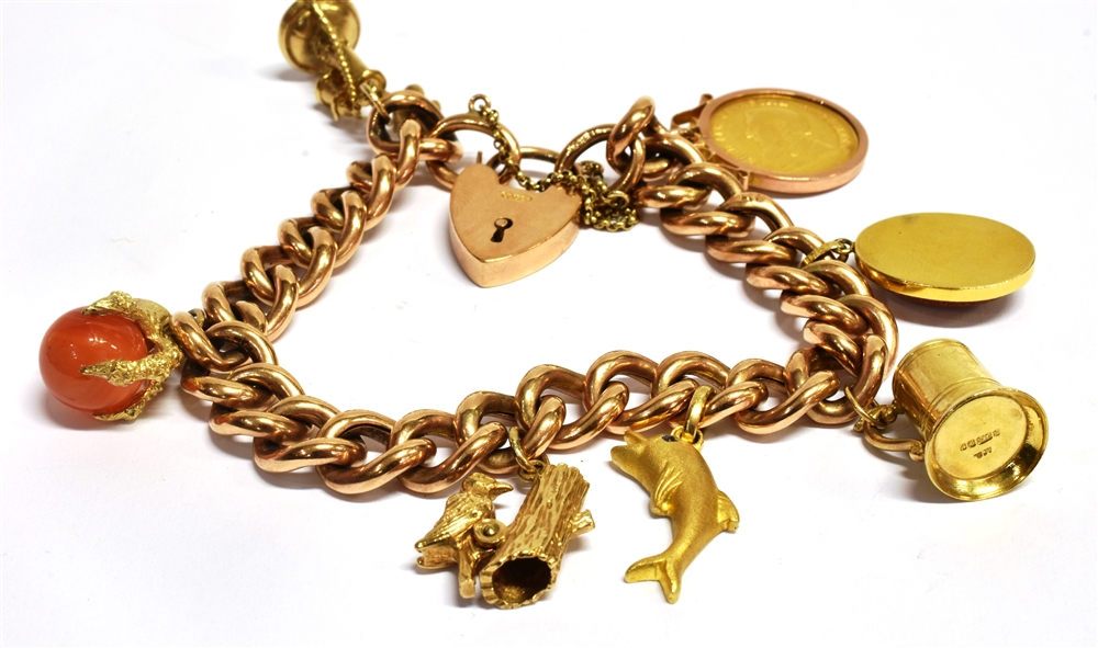 A MARKED 9C ROSE GOLD CURB LINK BRACELET With heart padlock and attached charms (7) majority of - Image 2 of 2