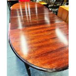A DANISH ROSEWOOD EXTENDING DINING TABLE with two additional leaves, 350cm long fully extended (