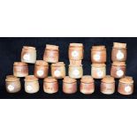 MUCHELNEY POTTERY: a collection of 18 spice jars with cork stoppers, six inscribed 'Mace', 'Nutmeg',