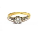 AN 18CT GOLD DIAMOND 0.5CT RING The ring set with a round cut diamond measuring 0.5mm in diameter