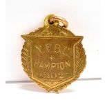 A 9CT GOLD FIREMAN CHALLENGE MEDAL adapted for pendant/fob, engraved for 1902, Birmingham