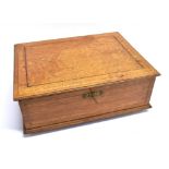 AN OAK BOX WITH BARBERS POLE PARQUETRY DECORATION and fitted interior, 36cm wide 27cm deep 13cm high