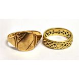 TWO 9CT GOLD RINGS A signet ring with engraved corner pattern (one corner pattern worn) faded