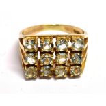 A 9CT GOLD, CLEAR PASTE CLUSTER RING the rectangular cluster measuring 1.6 x 1.2cm, with openwork