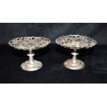 A PAIR OF CHINESE WHITE METAL COMPORTS The bowl with pierced decoration, height 9.5cm, bowl diameter