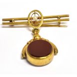 A MARKED 9C BLOODSTONE SPINNER BAR BROOCH the brooch with central seed pearl detail with a drop