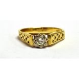 A VINTAGE 18CT GOLD DIAMOND RING The round cut diamond measuring approx. 0.25cm in diameter in a