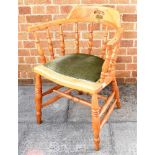 A FRUITWOOD SMOKERS BOW ARMCHAIR with upholstered seat, on double H-shape stretcher base Condition