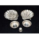 A COLLECTION OF SILVER comprising two footed shell bon bon dishes (non-matched), two miniature