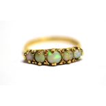 A 9CT GOLD, OPAL FIVE STONE DRESS RING the shank with faded hallmark, ring size Q, weight 2.9grams