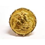 A QUEEN ELIZABETH II FULL GOLD SOVEREIGN RING the 1974 sovereign set in 9ct yellow gold,