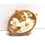 A MARKED 9C MOUNTED CAMEO BROOCH the finely carved cameo featuring a chariot scene, fitted with a