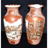 A LARGE PAIR OF JAPANESE KUTANI VASES decorated with samurais and geishas, signed to bases, 42cm