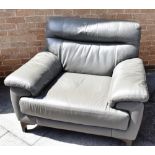 A LARGE GREY LEATHER UPHOLSTERED ARMCHAIR 115cm wide Condition Report : good conditon, with fire