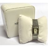 A LADIES NINA RICCI STEEL BRACELET WATCH The mother of pearl dial insert to a steel mesh bracelet,