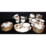 A COLLECTION OF ROYAL ALBERT 'OLD COUNTRY ROSES' TEAWARES comprising thirteen cups, eleven