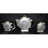 A SILVER PLATED ART DECO STYLE THREE PIECE TEA SET the teapot 18cm high Condition Report : good