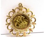 A QUEEN ELIZABETH II HALF SOVERIGN PENDANT PIECE The coin mounted in an open work yellow mount,