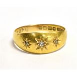 AN 18CT GOLD DIAMOND STAR SET GYPSY RING the ring hallmarked for Birmingham 1906, maker A.W.C &Co,