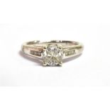A 14CT WHITE GOLD DIAMOND CRISS CROSS QUARTER RING The central feature intricately designed with