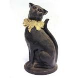A CAST METAL DOORSTOP MODELLED AS A SEATED CAT with inset orange plastic eyes, the reverse marked '