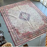 A LARGE RED/CREAM GROUND CARPET 360cm x 460cm Condition Report : good size, but pile is worn in