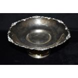 AN ART DECO SILVER PEDESTAL DISH the dish of plain form with the rim of fluted pattern, hallmarked