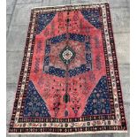 A RED GROUND AFSHAR RUG 243cm x 163cm Condition Report : good colours, thick pile Condition