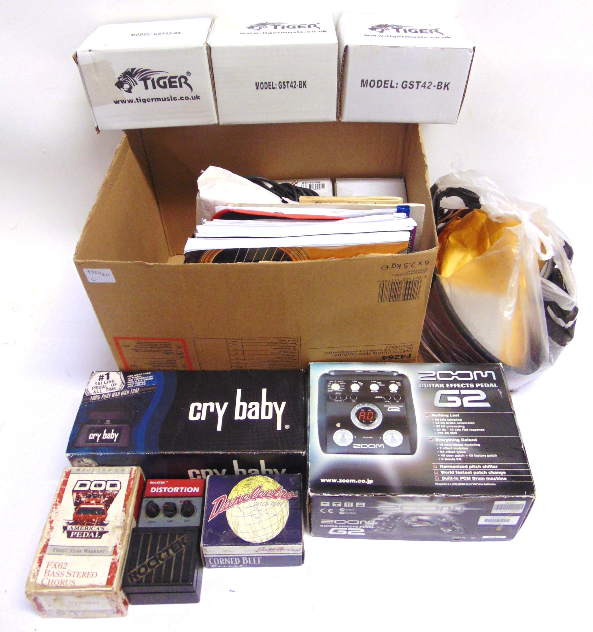 ASSORTED GUITAR ACCESSORIES comprising a Cry Baby Wah Wah Pedal, boxed; Zoom Guitar Effects Pedal