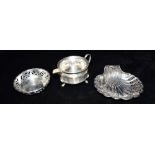 A SMALL COLLECTION OF SILVER AND SILVER PLATE A silver shell dish with pierced boarder, forward roll