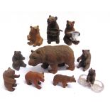 TEN ASSORTED BLACK FOREST & SIMILAR CARVED WOOD BEARS including one seated holding a metal