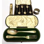 A COLLECTION OF SILVERWARE A cased silver desert spoon and large three prong silver fork, both