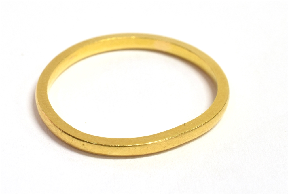 A 22CT GOLD BAND RING (bent shape), size M approx. weight 1.8grams, no condition report available