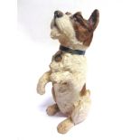 A CREMMA DOG FOOD COMPOSITION ADVERTISING FIGURE by Pytram Limited, in the form of a begging terrier