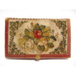 SEWING ACCESSORIES - A WILLIAM IV EMBROIDERED WOOLWORK & CRIMSON GILT LEATHER NEEDLE CASE part lined