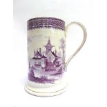 A LARGE LATE 19TH CENTURY TANKARD OR MUG with manganese transfer-printed decoration, the base