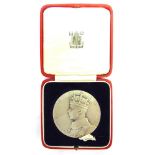 A 1937 CORONATION MEDAL sterling silver, with a matt finish, in Royal Mint case of issue.