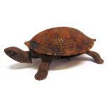 A NOVELTY SHOP COUNTER BELL IN THE FORM OF A TORTOISE of cast metal and faux tortoiseshell (