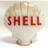 A SHELL PETROL PUMP GLOBE of white glass with raised red lettering, 44cm high. Condition Report :